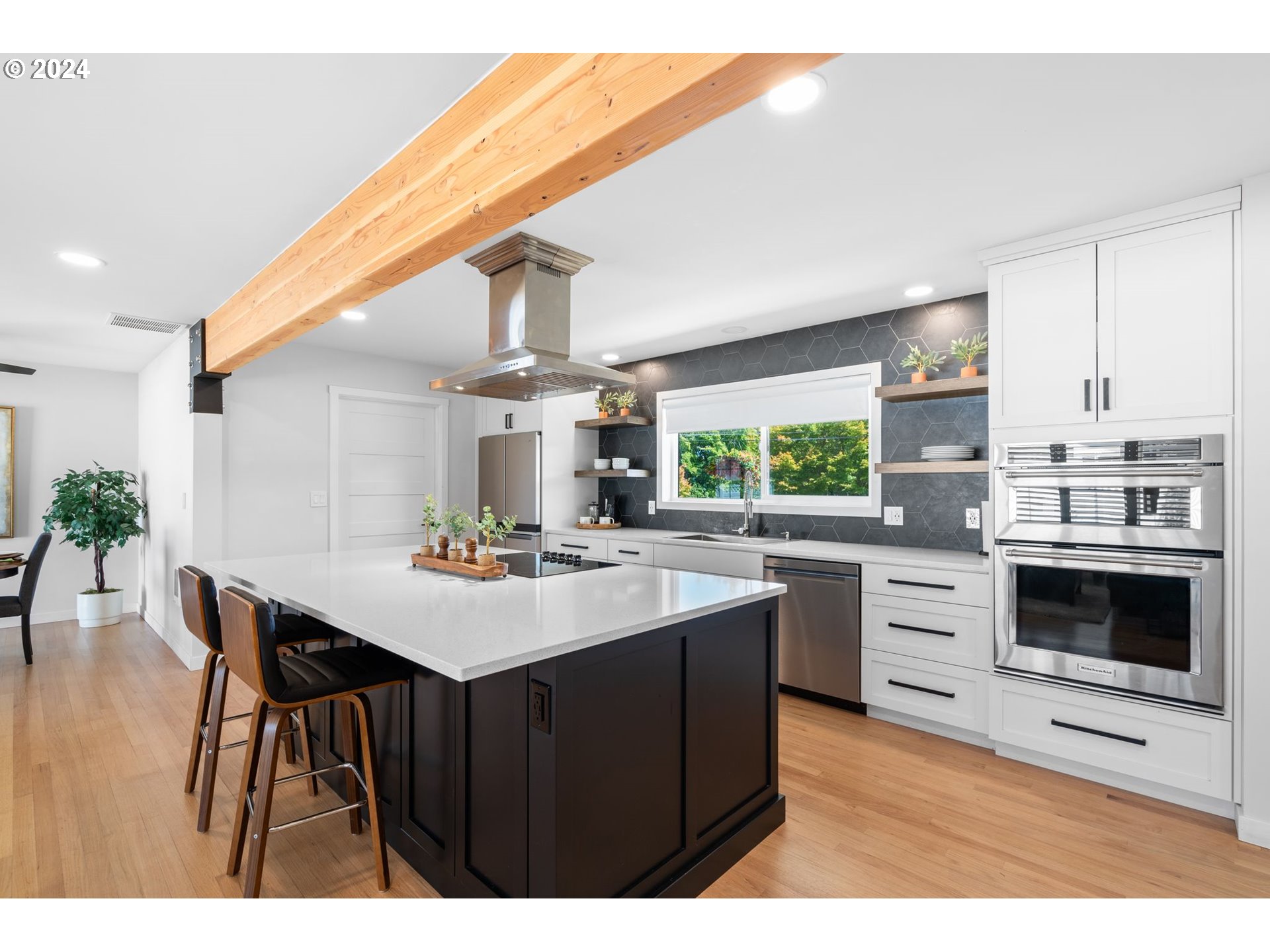 1617 Northeast Ione Loop Camas, WA 98607 - Photo 5 of 15 a kitchen with a stove a sink dishwasher and a refrigerator