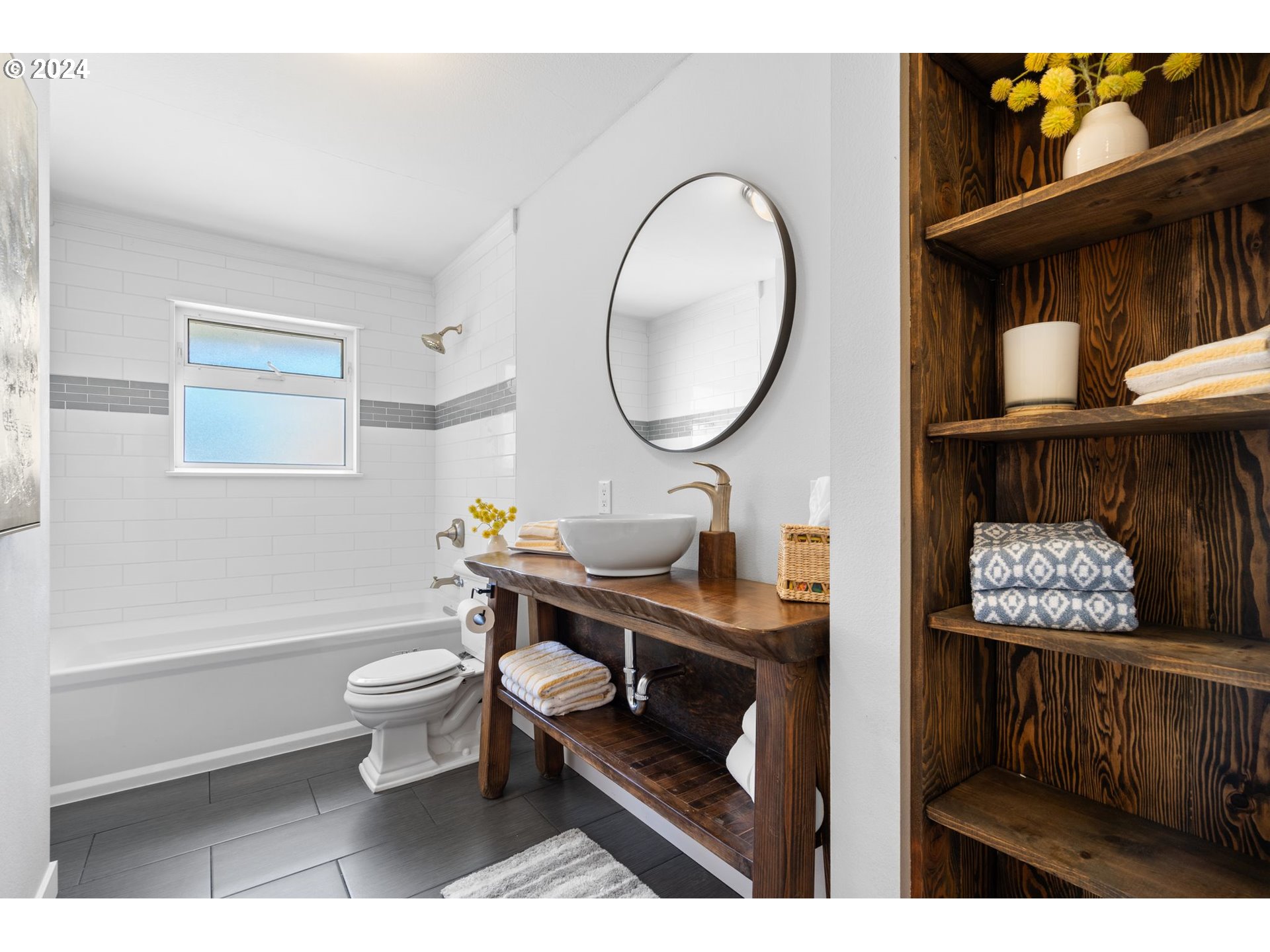 1617 Northeast Ione Loop Camas, WA 98607 - Photo 7 of 15 a bathroom with a toilet a sink and a mirror