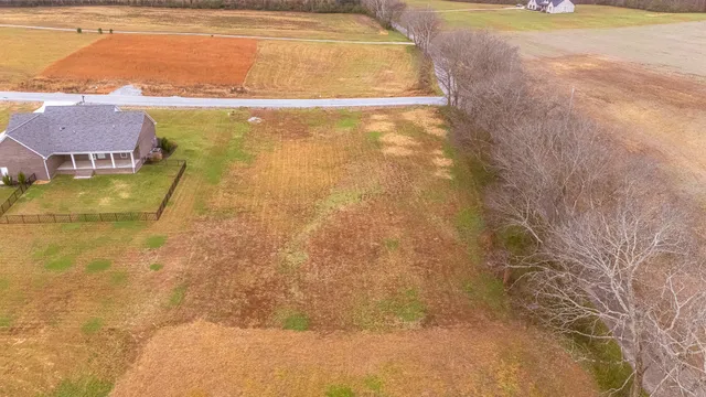 a view of residential houses with ocean view