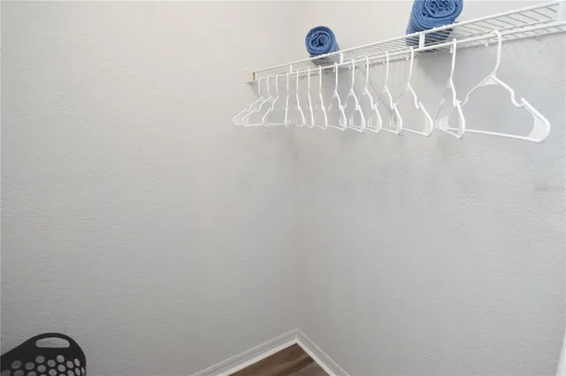 an aerial view of a house with outdoor space pool seating area and yard