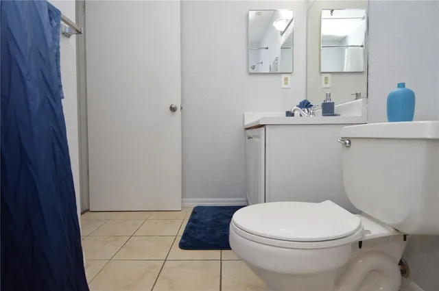 an aerial view of residential houses with outdoor space and river