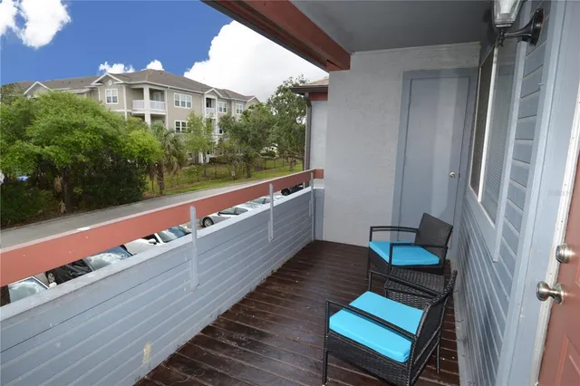 an aerial view of residential house with outdoor space and lake view