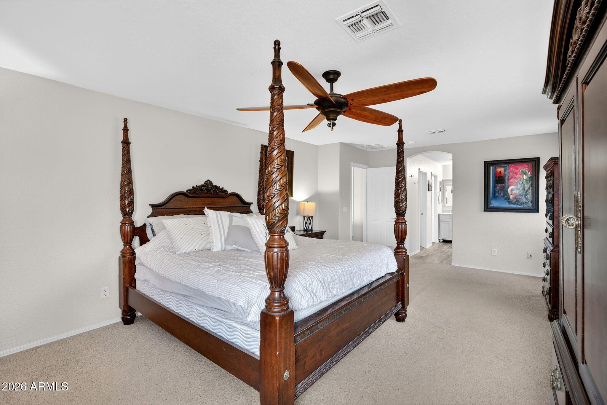 6280 South Sinova Court Gilbert, AZ 85298 - Photo 35 of 64 a bedroom with a bed and a flat screen tv