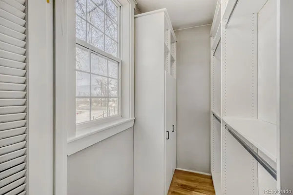 a utility room with cabinets washer and dryer