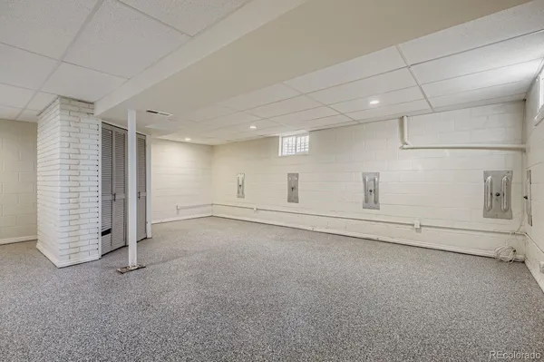 a view of a big room with storage and utility room