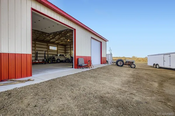 a view of a yard with an outdoor space