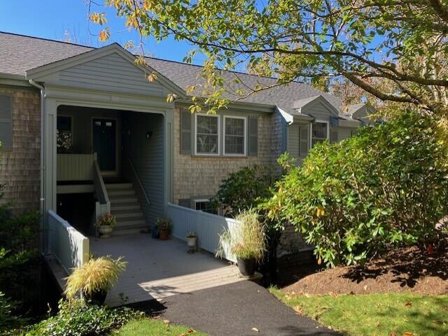 407 Orleans Road, Unit B Chatham, MA 02650 - Photo 1 of 16 front view of a house with a yard