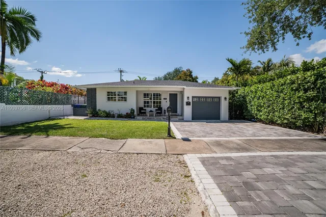 front view of house with a yard