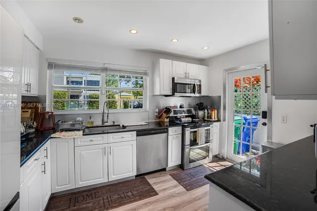 a house with garden in front of it