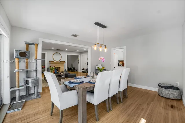 a bathroom with a sink toilet tub and shower