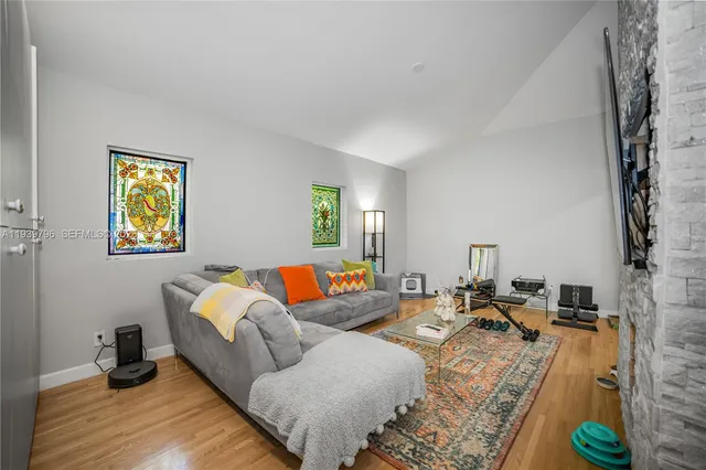 a living room with furniture and a couch