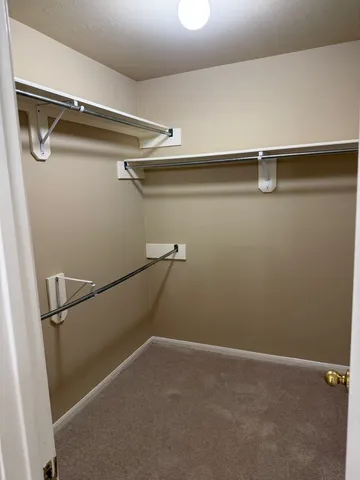 a view of wooden floor with a window