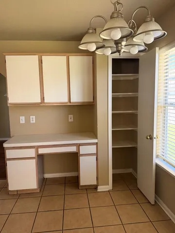 a view of small space with racks on the wall