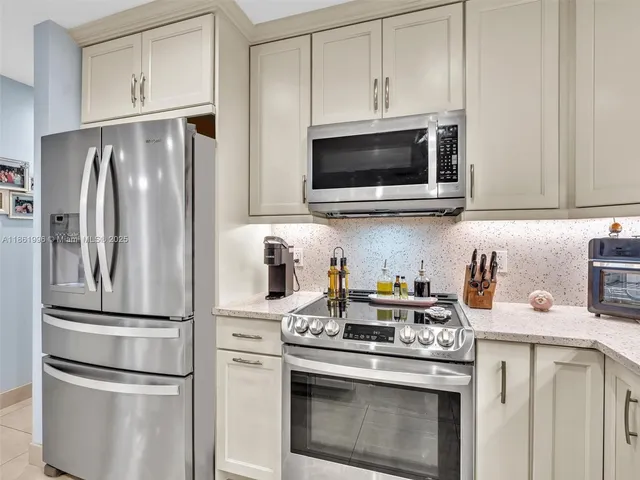 $359,000 | 120 Cypress Club Drive, Unit 202, Pompano Beach, FL 33060