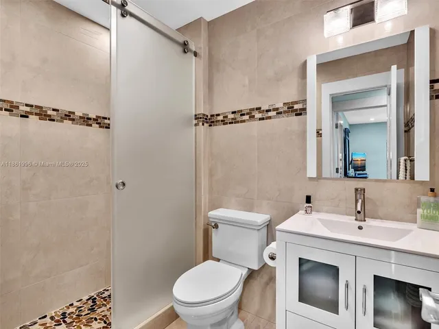 $359,000 | 120 Cypress Club Drive, Unit 202, Pompano Beach, FL 33060