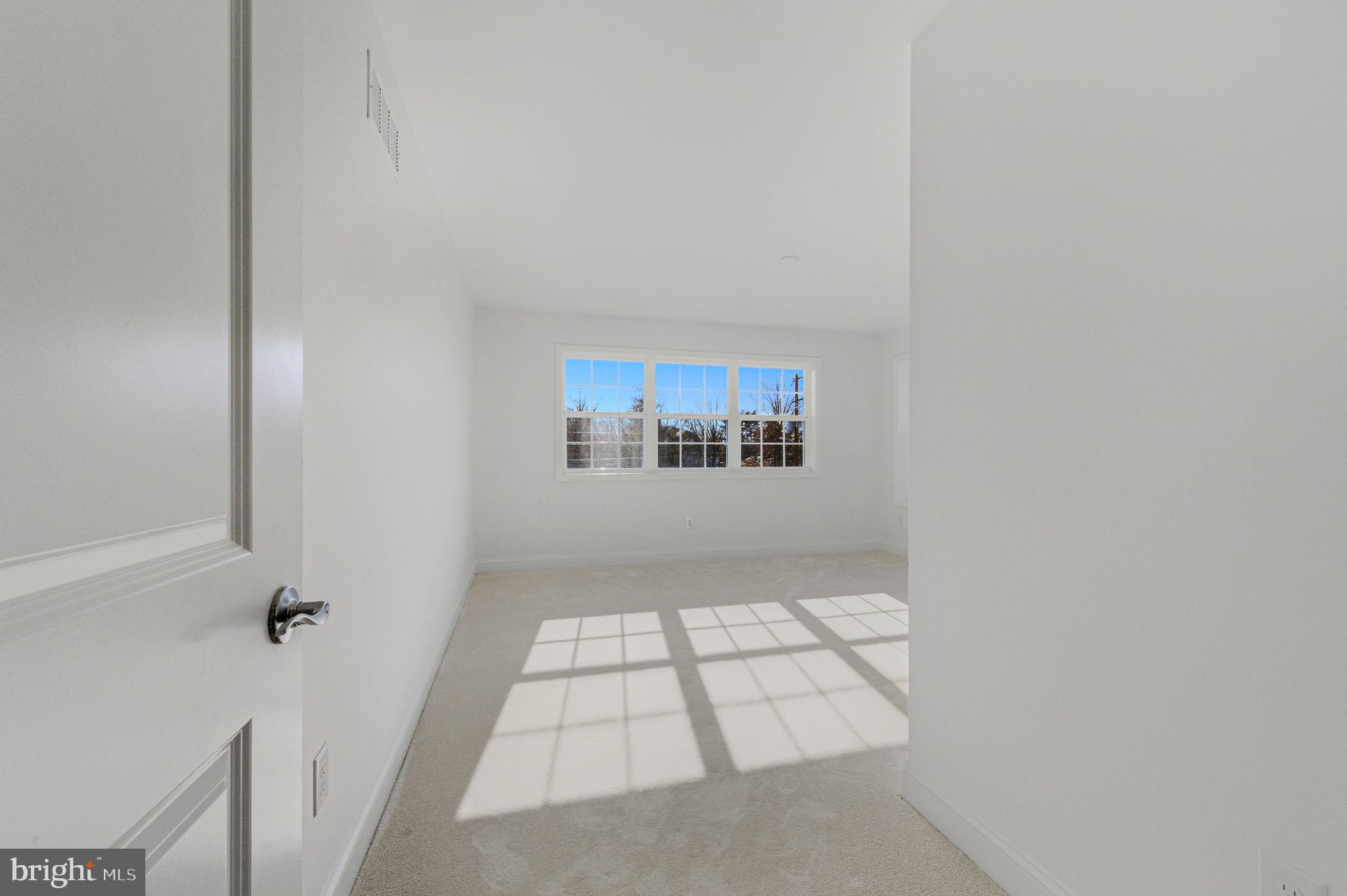 2503 A Duncan Road Wilmington, DE 19808 - Photo 25 of 39 a view of an empty room and a window
