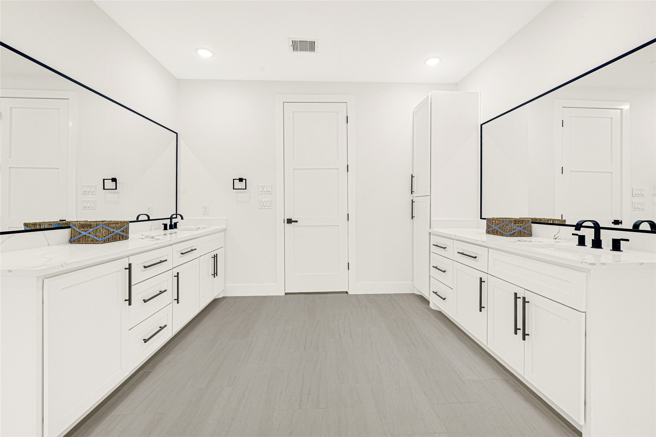 16915 Hamill Drive Rosharon, TX 77583 - Photo 39 of 47 a large white bathroom with double vanity sink a mirror and a bathtub