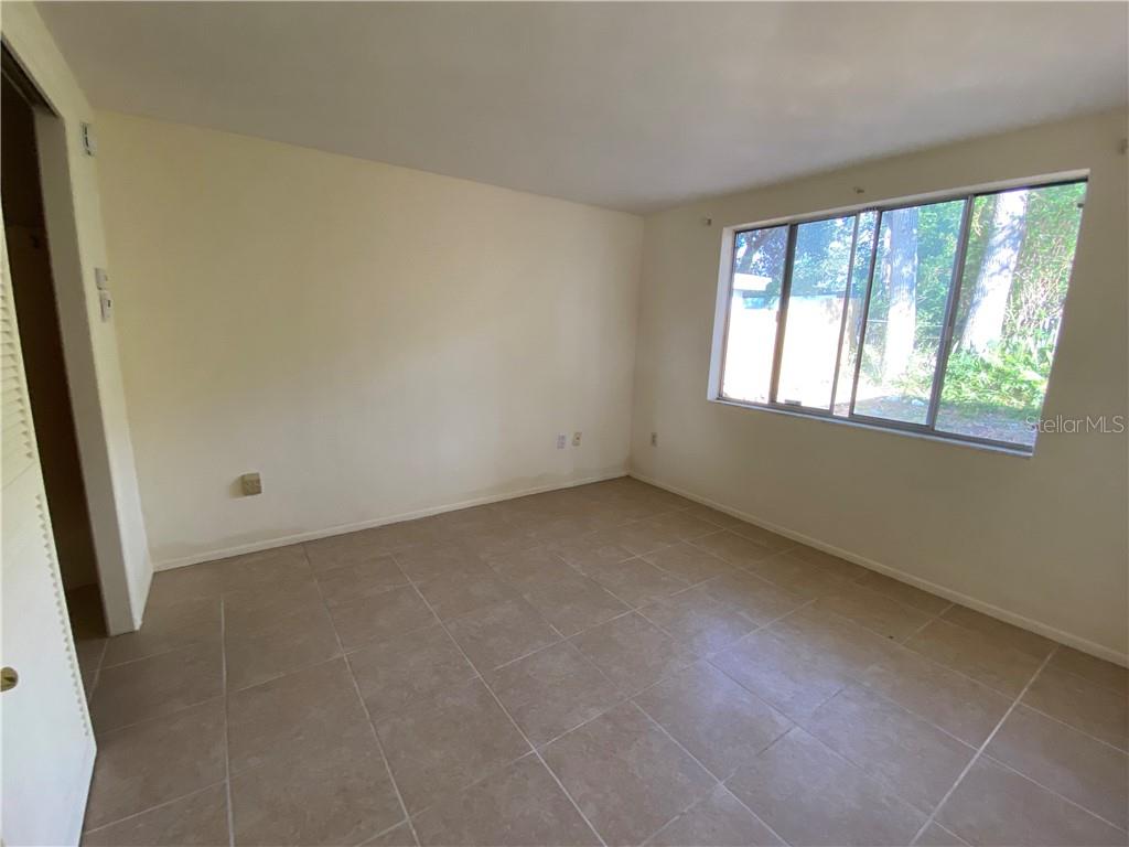 3612 Springfield Drive Holiday, FL 34691 - Photo 10 of 13 an empty room with windows