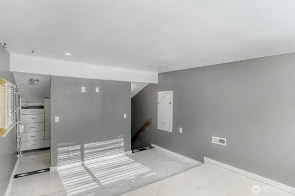 a view of walk in closet with cabinet