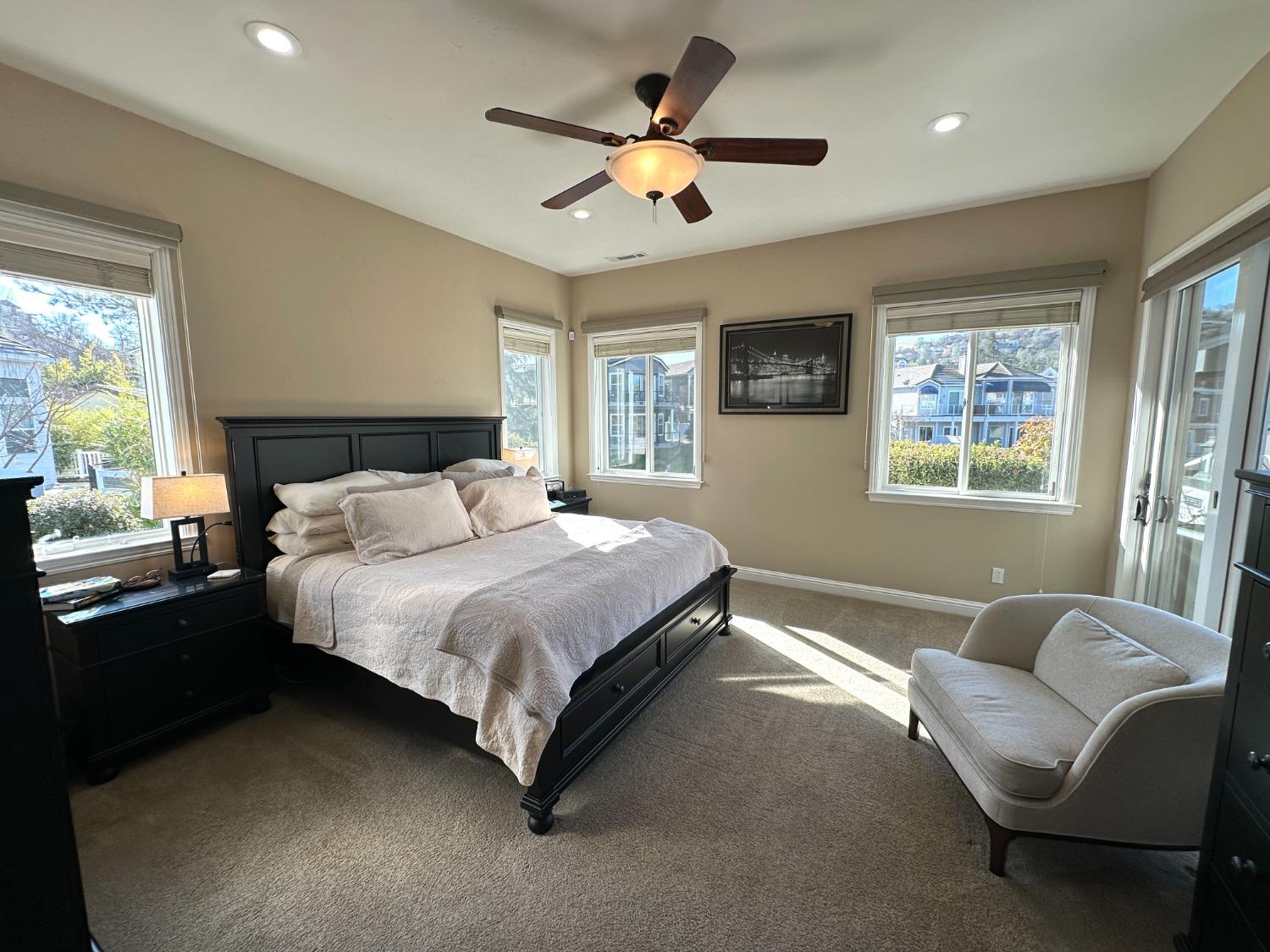 5 Paseo Delago Copperopolis, CA 95228 - Photo 14 of 39 a bedroom with a bed couch and window