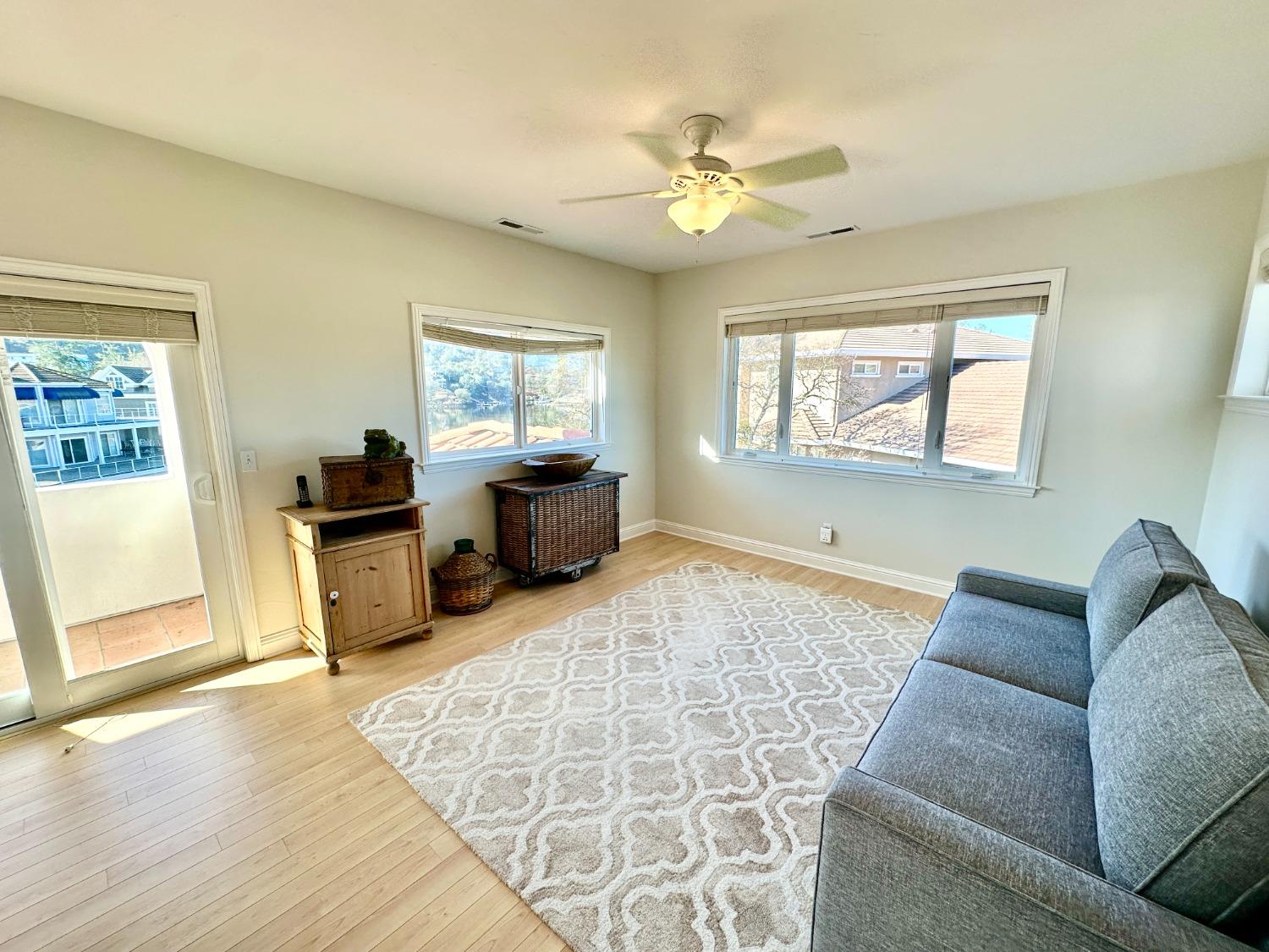 5 Paseo Delago Copperopolis, CA 95228 - Photo 26 of 39 a living room with furniture and a flat screen tv