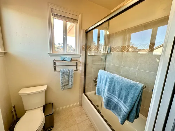 a bathroom with a toilet and a sink