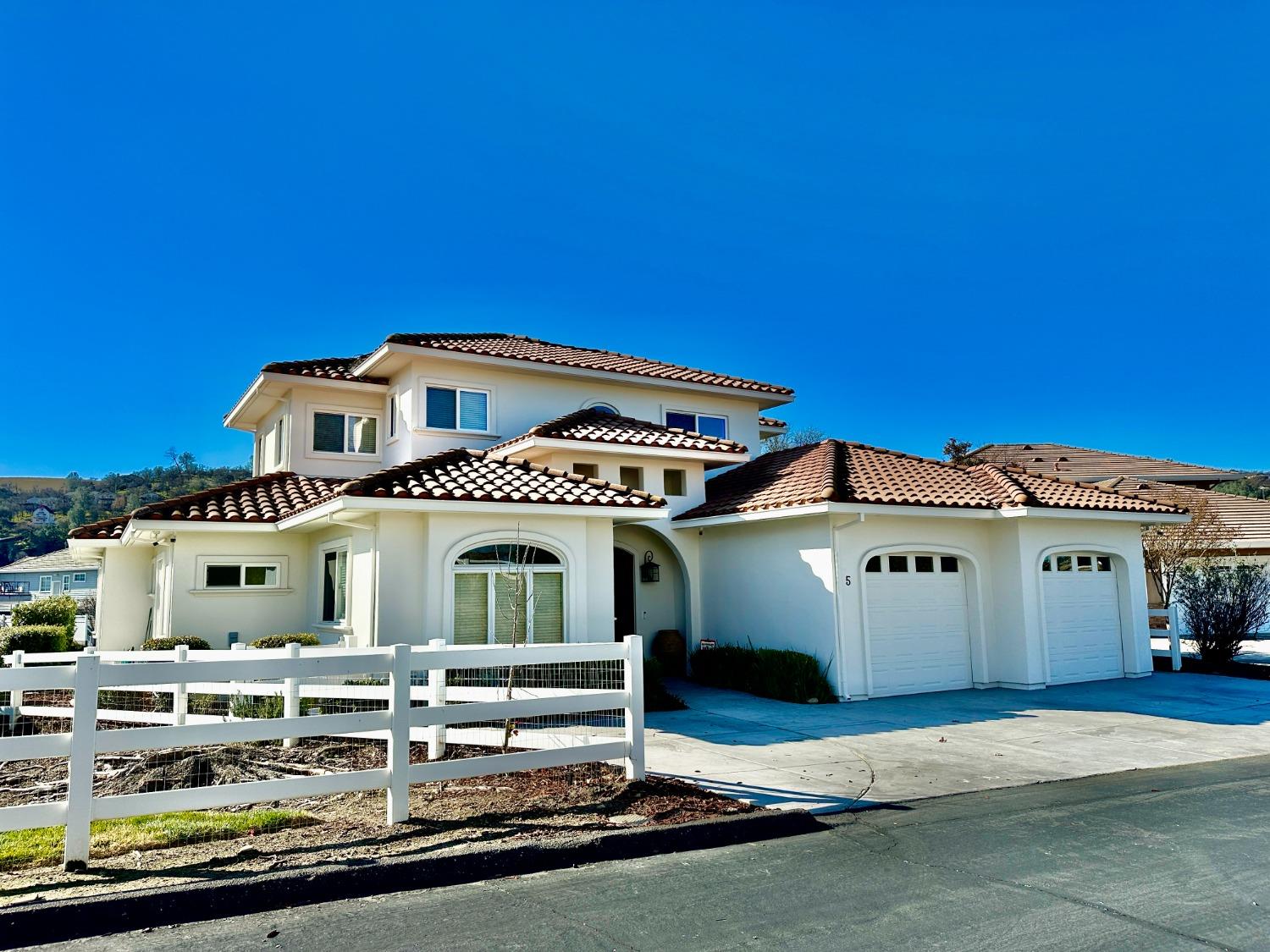 5 Paseo Delago Copperopolis, CA 95228 - Photo 37 of 39 a front view of a house with a garden