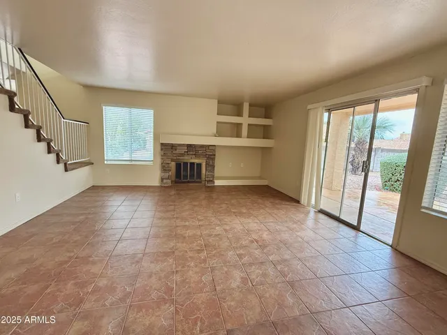 a kitchen with stainless steel appliances a sink stove and cabinets
