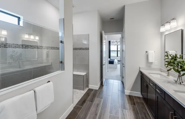 a view of a hallway view with wooden floor and staircase