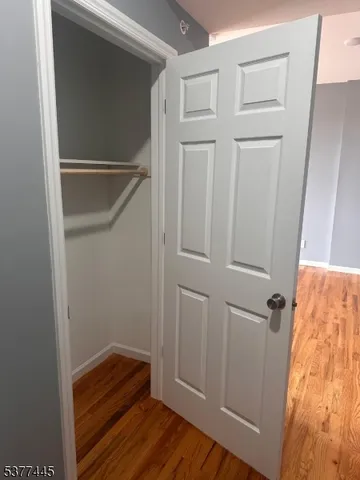 a kitchen with a stove a refrigerator and a sink