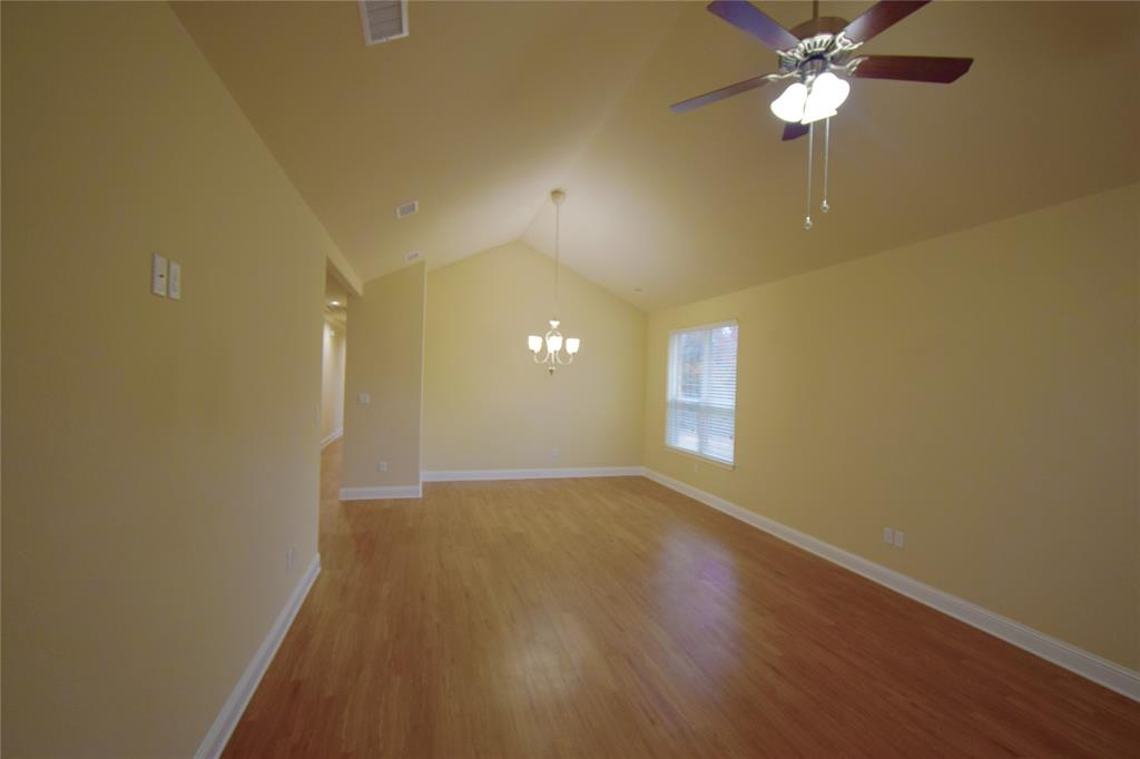 3901 Montecito Drive, Unit 2016 Denton, TX 76210 - Photo 13 of 15 Another view of the spacious living and dining room area.