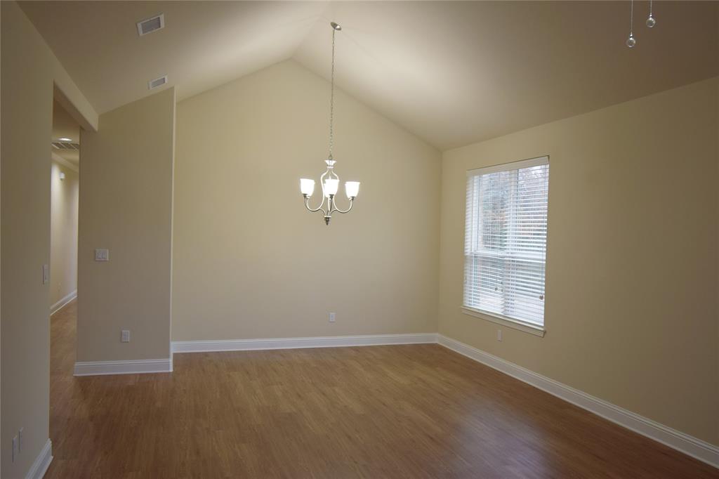 3901 Montecito Drive, Unit 2016 Denton, TX 76210 - Photo 3 of 15 The separate dining area allows room for entertaining guests.
