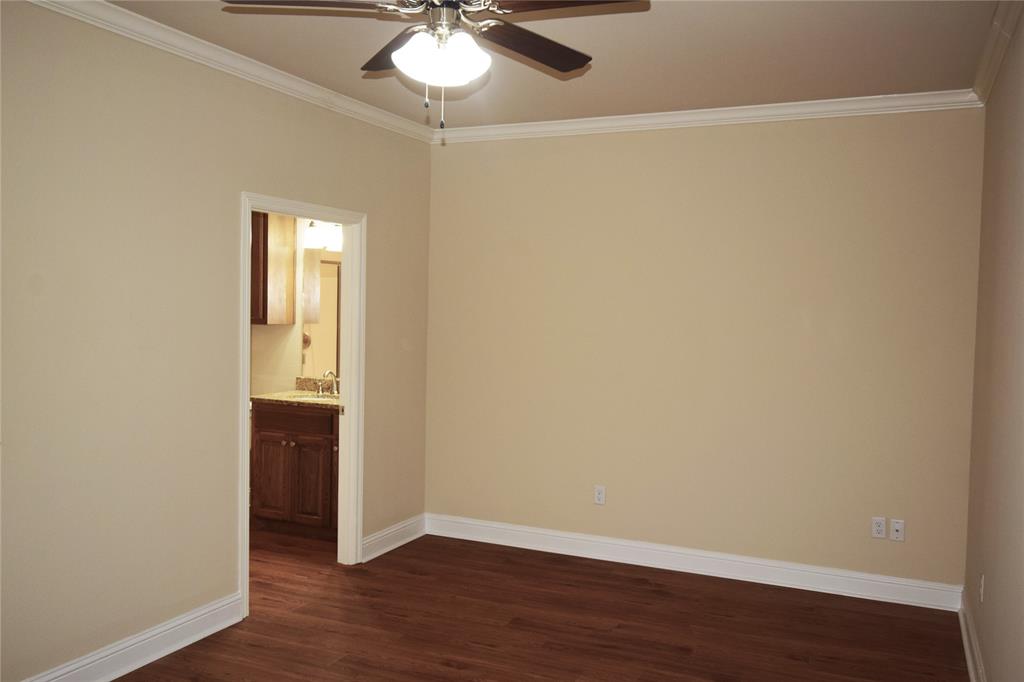 3901 Montecito Drive, Unit 2016 Denton, TX 76210 - Photo 5 of 15 The spacious primary bedroom includes an ensuite bath.