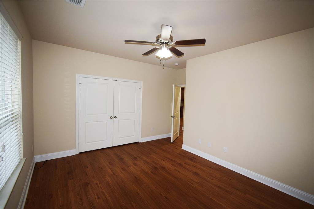 3901 Montecito Drive, Unit 2016 Denton, TX 76210 - Photo 10 of 15 The second bedroom has great space and nice sized closet.