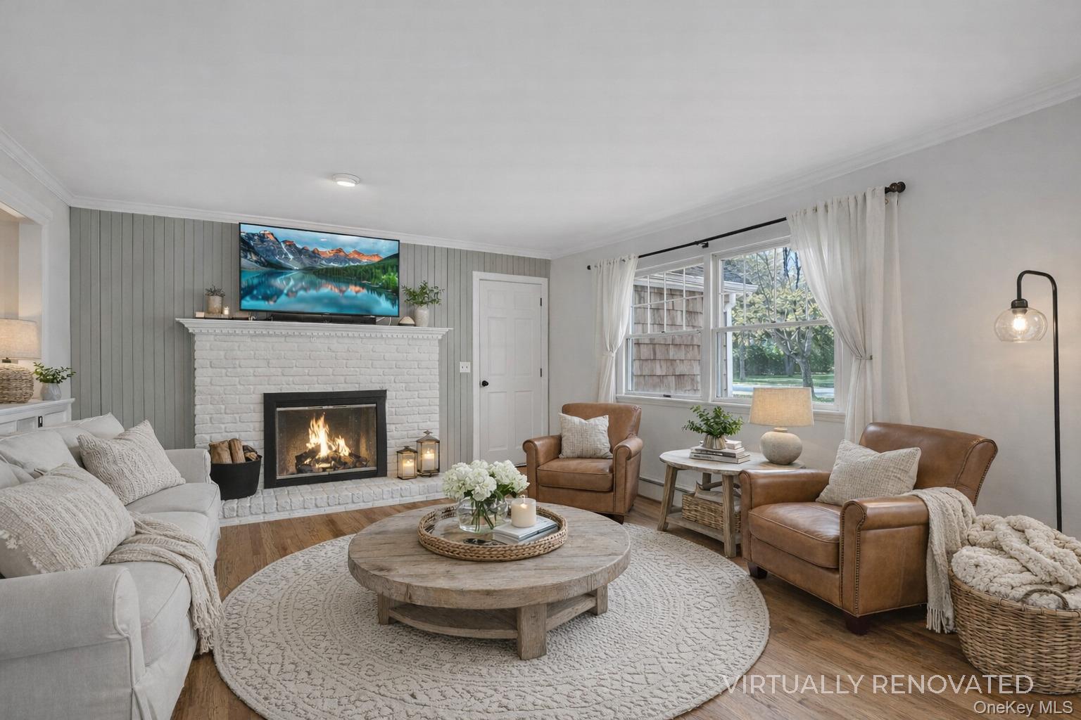 48 Nidzyn Avenue Remsenburg, NY 11960 - Photo 15 of 43 a living room with furniture and a fireplace