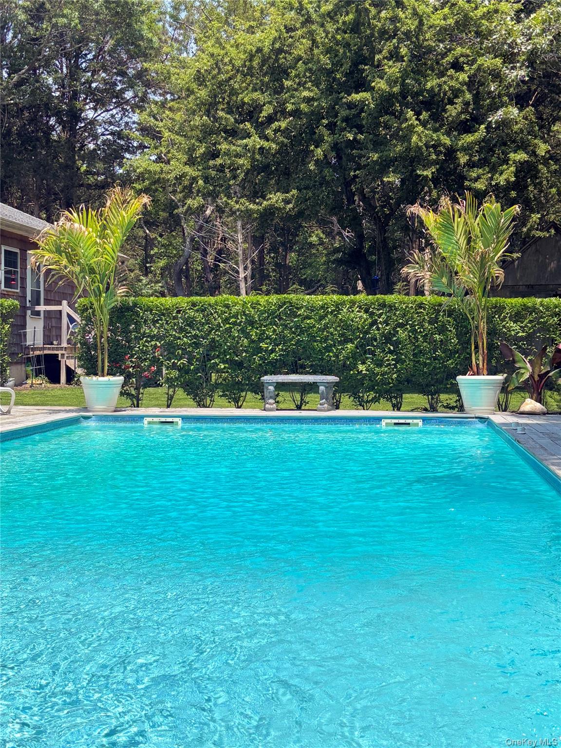 48 Nidzyn Avenue Remsenburg, NY 11960 - Photo 35 of 43 View of pool featuring a patio