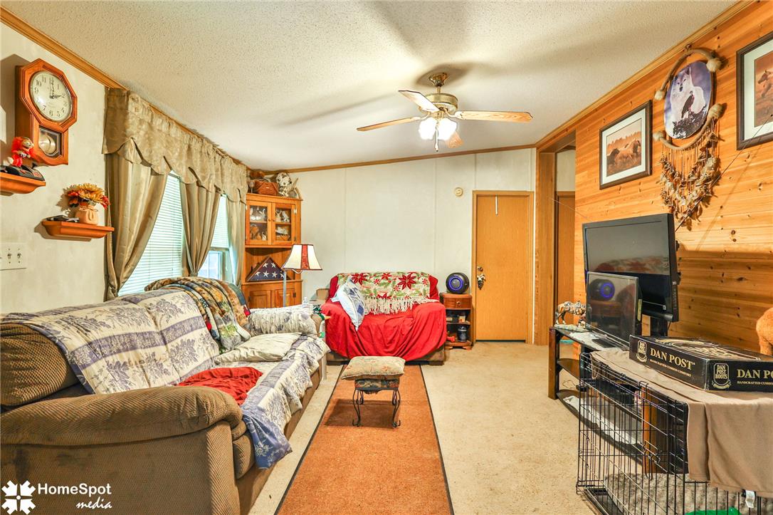 3795 Rhoades Road Kempton, PA 19529 - Photo 6 of 42 Comfortable living space featuring a ceiling fan and a window for natural light.