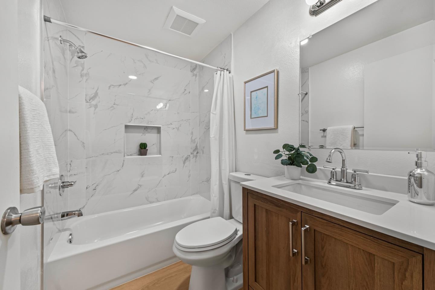 280 Easy Street, Unit 311 Mountain View, CA 94043 - Photo 14 of 29 a bathroom with a sink toilet and shower