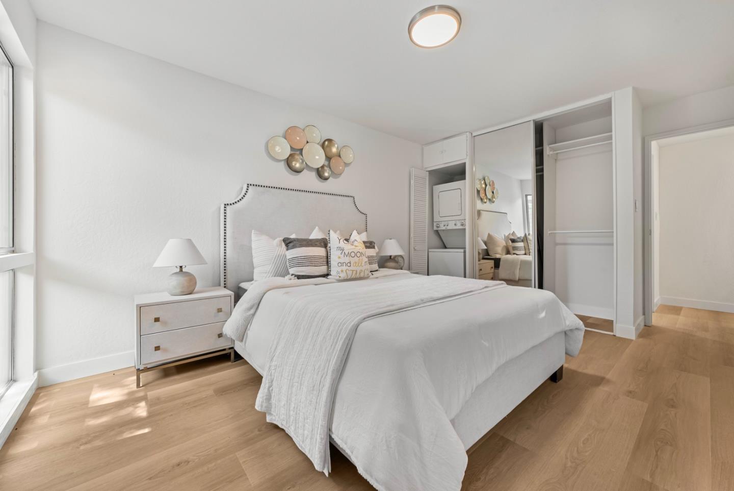 280 Easy Street, Unit 311 Mountain View, CA 94043 - Photo 18 of 29 a bedroom with a bed and painting on the wall