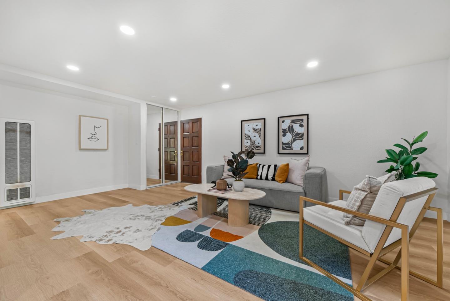 280 Easy Street, Unit 311 Mountain View, CA 94043 - Photo 2 of 29 a work room with furniture and wooden floor