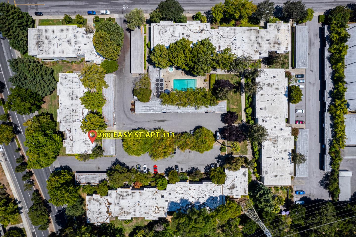 280 Easy Street, Unit 311 Mountain View, CA 94043 - Photo 24 of 29 an aerial view of a house with a yard and green space
