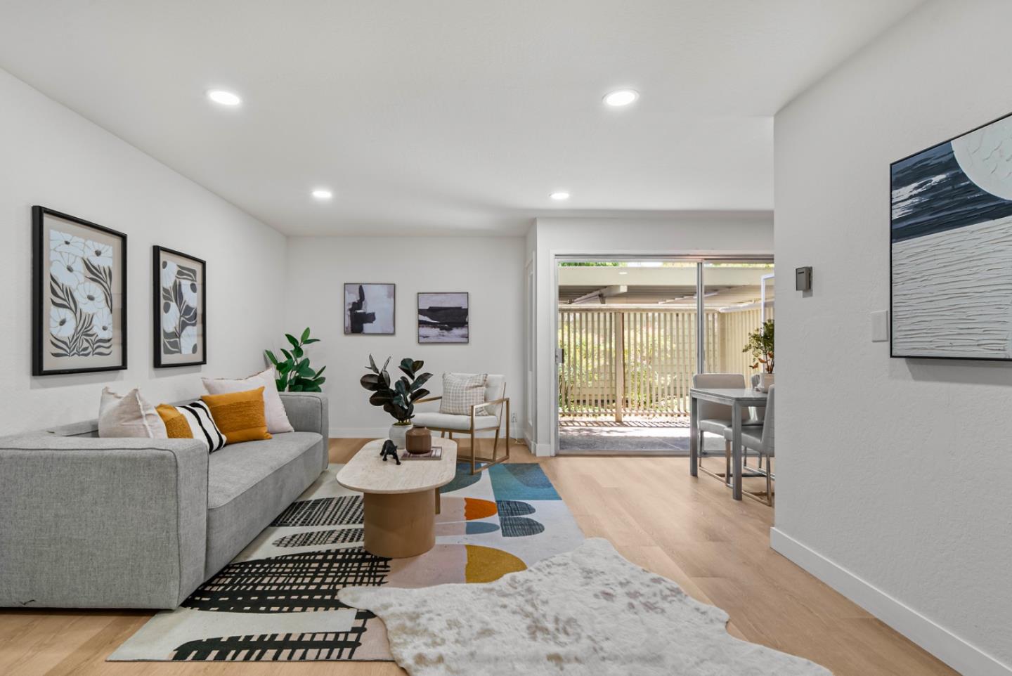 280 Easy Street, Unit 311 Mountain View, CA 94043 - Photo 4 of 29 a living room with furniture and wooden floor
