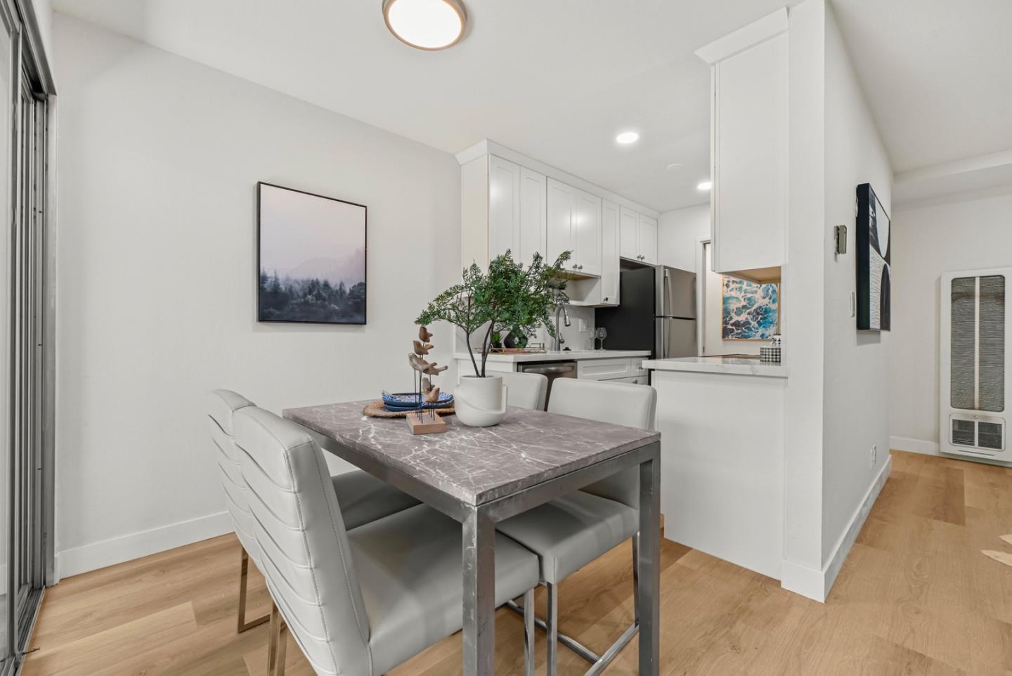 280 Easy Street, Unit 311 Mountain View, CA 94043 - Photo 6 of 29 a view of a dining room with furniture