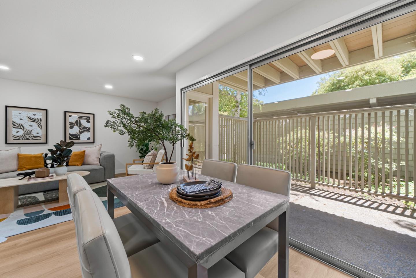 280 Easy Street, Unit 311 Mountain View, CA 94043 - Photo 8 of 29 a living room with furniture and a potted plant