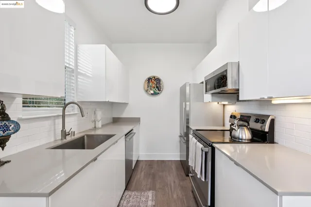 a kitchen with a microwave a stove and a microwave