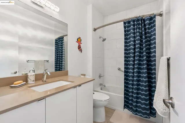 a view of a chair and table in the balcony