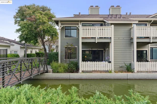 a view of a car park in front of house
