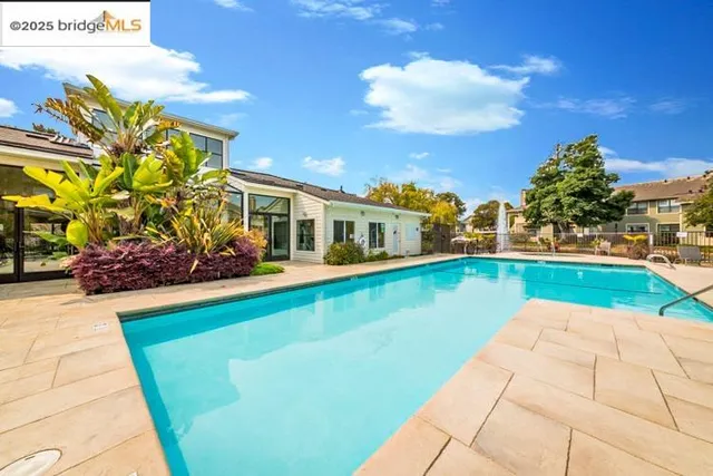 a view of residential houses with outdoor space