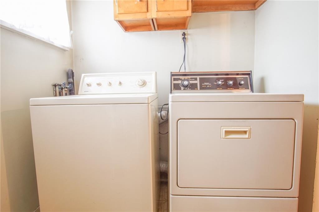 908 2nd Street McKees Rocks, PA 15136 - Photo 6 of 13 a utility room with dryer and washer