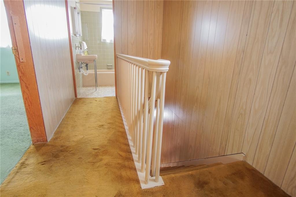 908 2nd Street McKees Rocks, PA 15136 - Photo 7 of 13 a view of a hallway with wooden floor